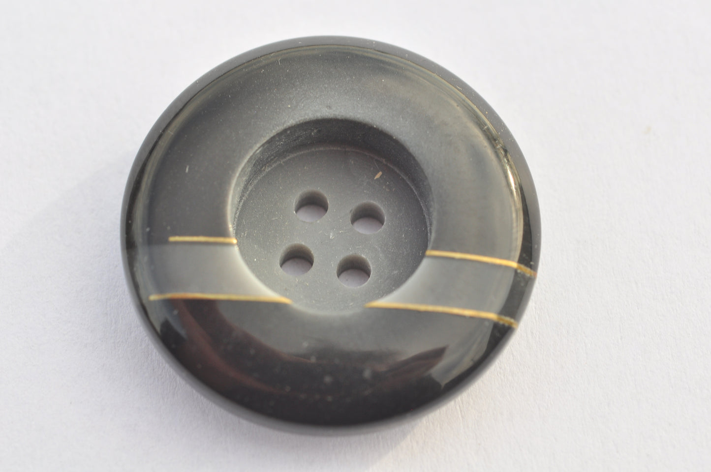 Black Button with Golden Line