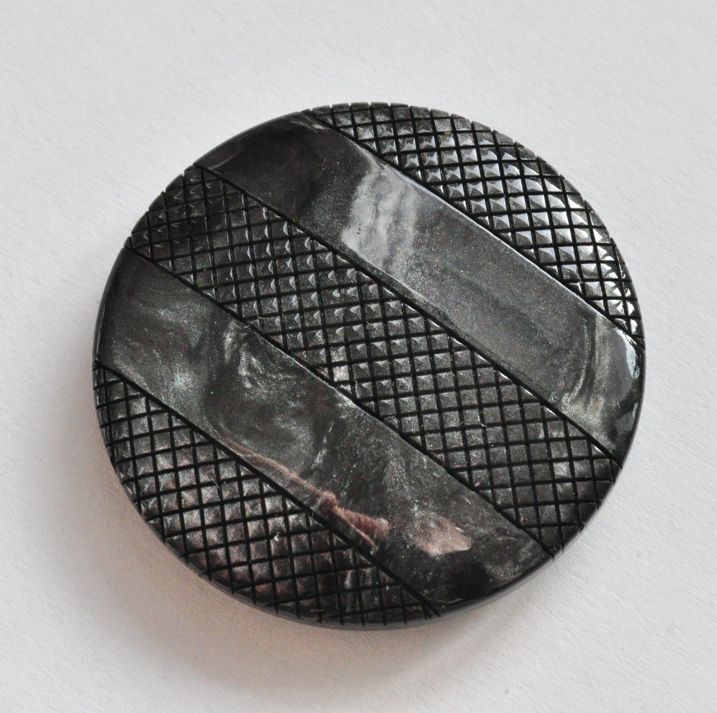 Glossy Black and Gold Plastic Button