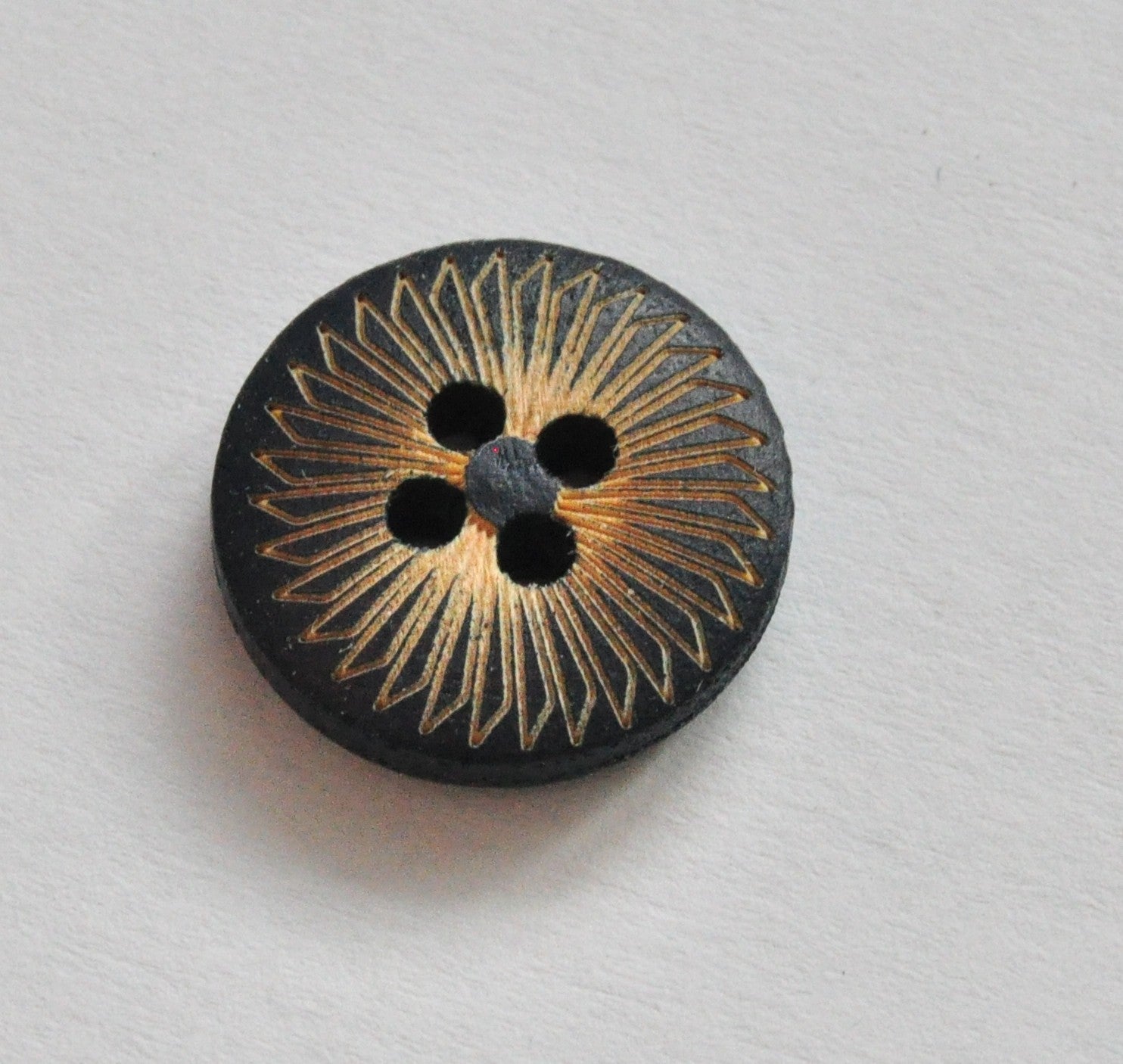 Glossy Black and Gold Plastic Button